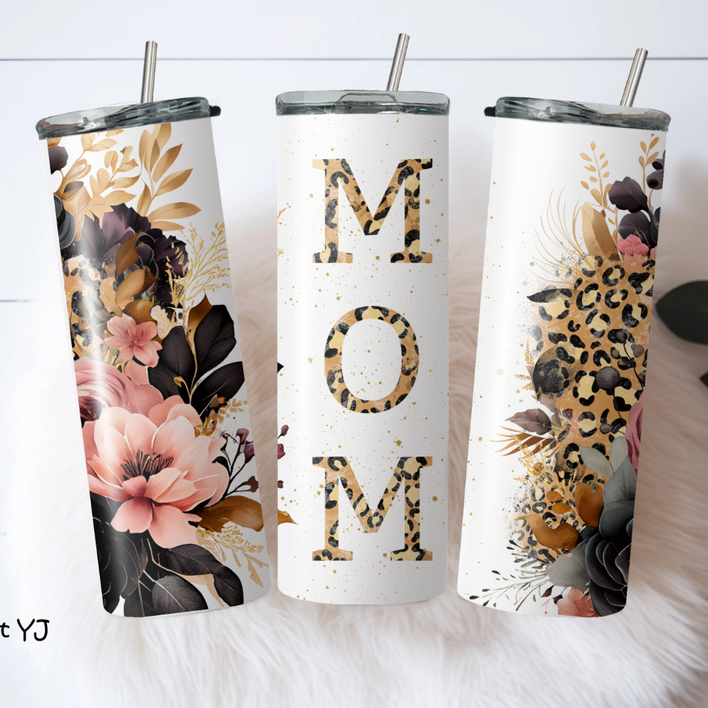 A set of three custom insulated travel cups with floral patterns and the word 'MOM' displayed prominently on the front.